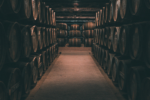 Rows of wine barrels in Cognac, France.