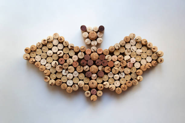 Wine corks bat silhouette Wine corks bat silhouette isolated on white background cork stopper stock pictures, royalty-free photos & images