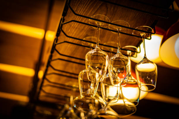 Wine glasses hanging on the ceiling stock photo