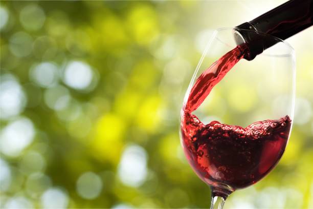 Wine. Red wine and glass on background red wine stock pictures, royalty-free photos & images