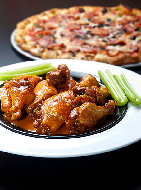 Best Pizza Wings Stock Photos, Pictures & Royalty-Free Images - iStock