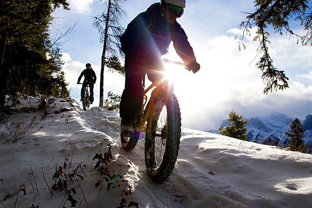 Winter Fat Bike Riders stock photo