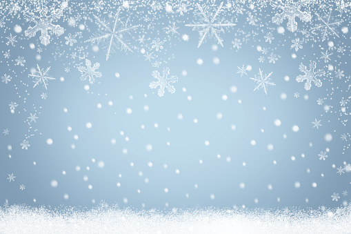 Winter holiday snow background design with snowflakes. Abstract light blue Christmas backdrop
