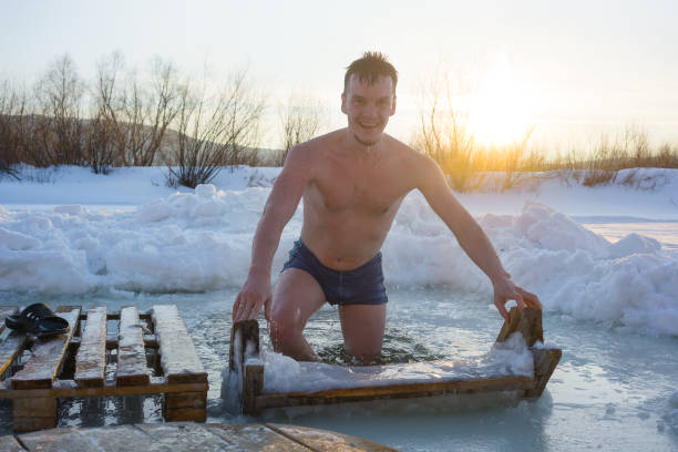 winter ice zwemmen - ice swimming stockfoto's en -beelden