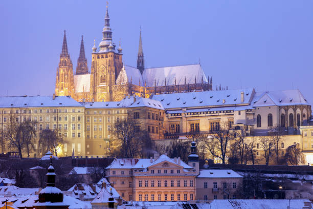 Winter in Prague - city panorama with St. Vitus Cathedral Winter in Prague - city panorama with St. Vitus Cathedral. Prague, Bohemia, Czech Republic. hradcany castle stock pictures, royalty-free photos & images