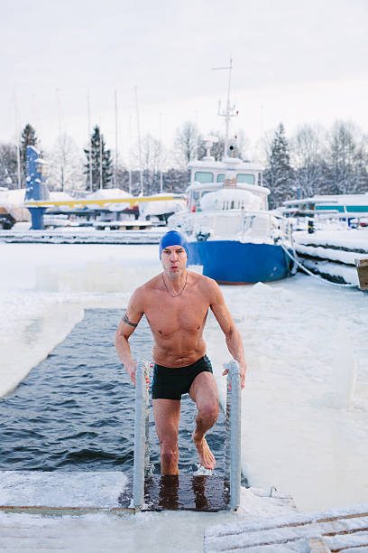winter swimmer - ice swimming stockfoto's en -beelden