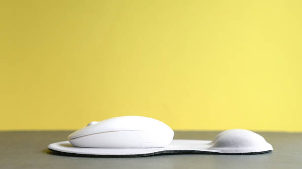 Wireless mouse and mouse pad with wrist rest. Isolated. stock photo