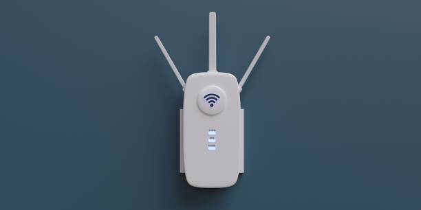 Wireless repeater WiFi extender isolated on blue wall. Internet booster, white, close up. 3d render stock photo