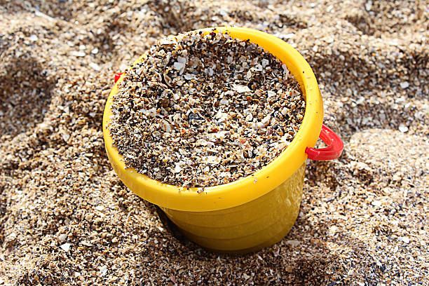 With sand bucket stock photo