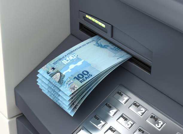 Withdrawal Brazilian Real From The ATM stock photo