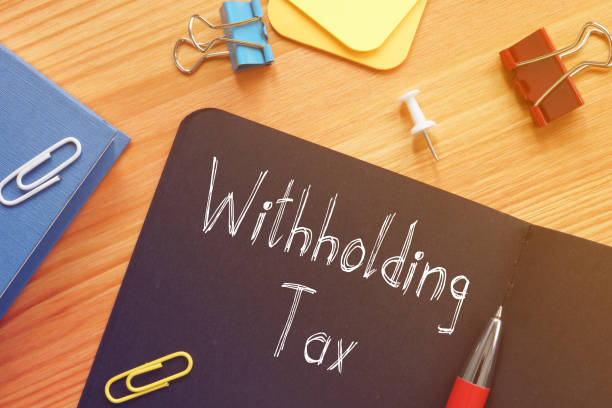 Withholding Tax is shown on the conceptual business photo Withholding Tax is shown on the conceptual business photo property withholding stock pictures, royalty-free photos & images