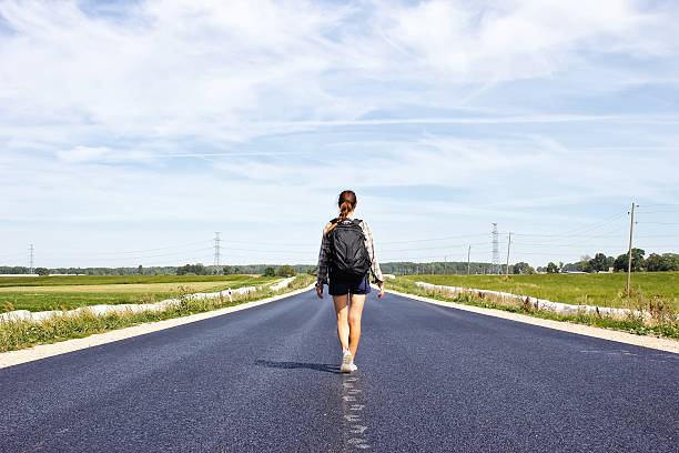 Image result for a woman standing on road