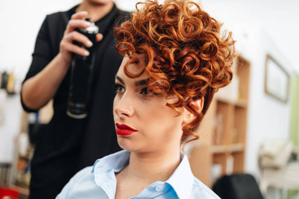 Woman at hair salon stock photo