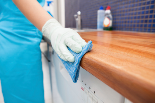 Woman Cleaning Kitchen Countertop Stock Photo Download Image Now