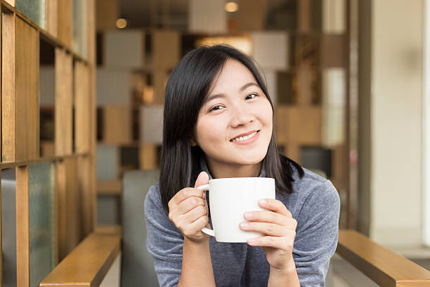 1,757 Asian Girl Drinking Coffee Stock Photos, Pictures & Royalty-Free  Images - iStock