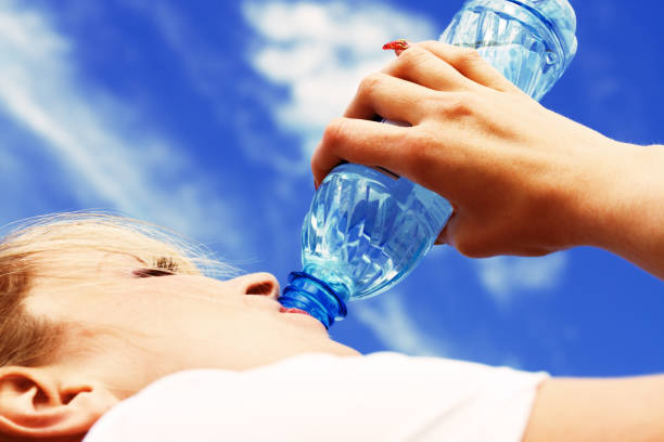 Woman Drinking Water stock photo