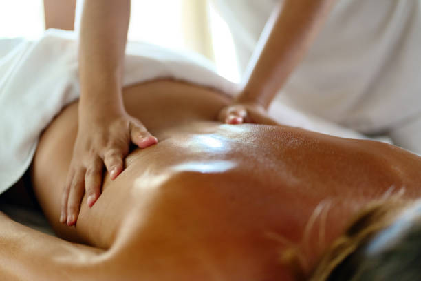 Woman Enjoying in Massage stock photo