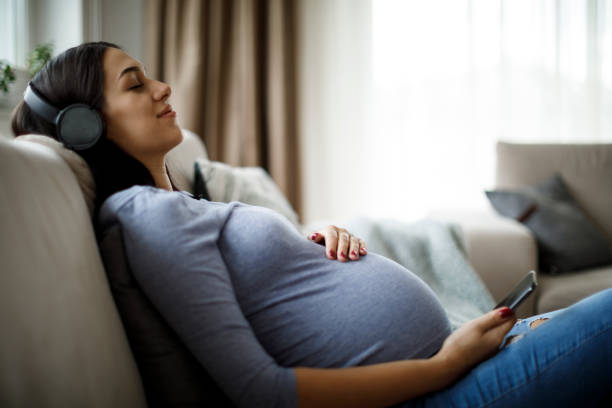 Woman enjoying pregnancy Woman enjoying pregnancy pregnancy and childbirth stock pictures, royalty-free photos & images