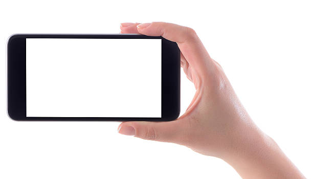 Woman hand holding white screen smart phone stock photo