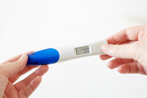 Woman Hands Holding Positive Digital Pregnancy Test Stock ...