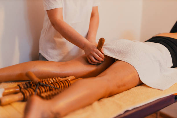 Woman having a cellulite reduction massage stock photo