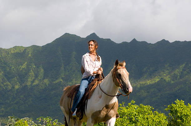 woman horse riding stock photo
