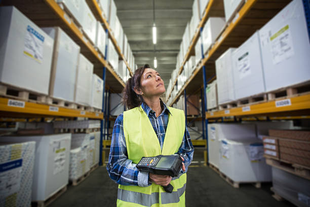 Woman in a warehouse stock photo