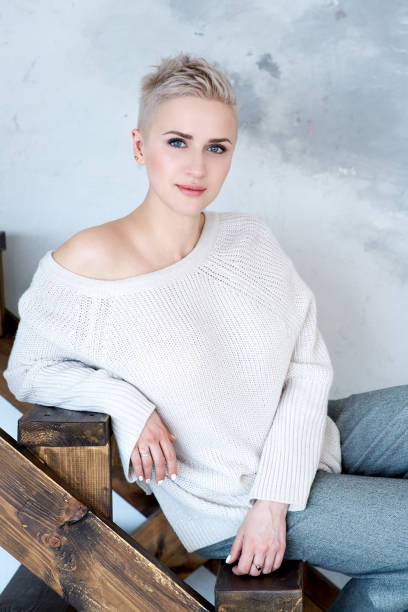 Woman in her 30s with short hair stock photo
