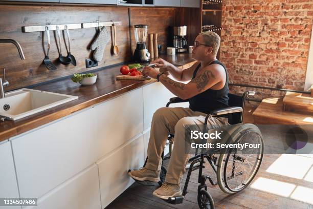 Woman in Wheelchair Cooking