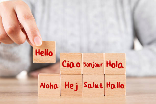 Woman is Arranging Hello Word in Different Languages Hello in many different languages linguistics stock pictures, royalty-free photos & images
