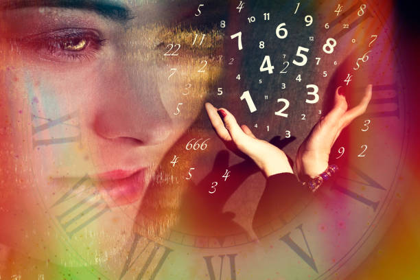 A woman looks at the hands from which numbers fly out, numerology A woman looks at the hands from which numbers fly out, numerology numerology stock pictures, royalty-free photos & images