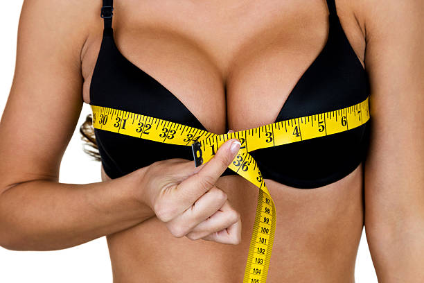 55 Voluptuous Woman Measuring Her Breast Size Stock Photos, Pictures &amp;  Royalty-Free Images - iStock