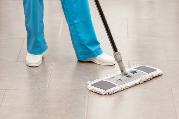 woman mopping the office floor Shot of an unrecognizable woman mopping the office floor cleaner photos stock pictures, royalty-free photos & images