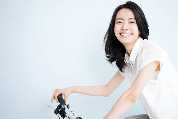 Woman on a bike stock photo
