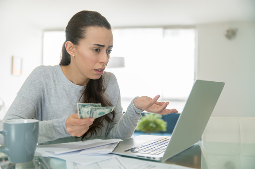 woman-on-a-video-call-with-her-landlord-and-struggling-to-pay-rent-picture-id1270299774?b=1&k=20&m=1270299774&s=170667a&w=0&h=N-qJGCkBVewmPO9k8Q4numFaW84NjN_0CDYnxDSaPtM=