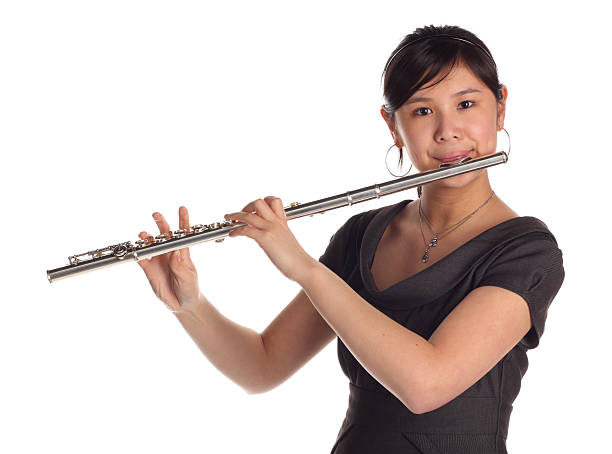 woman playing flute - flute player stock pictures, royalty-free photos &...