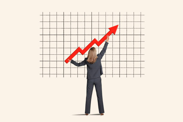 Woman Raises Red Arrow on Chart stock photo