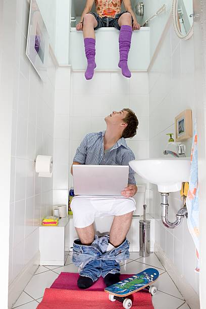 woman-sitting-above-man-on-toilet-pictur