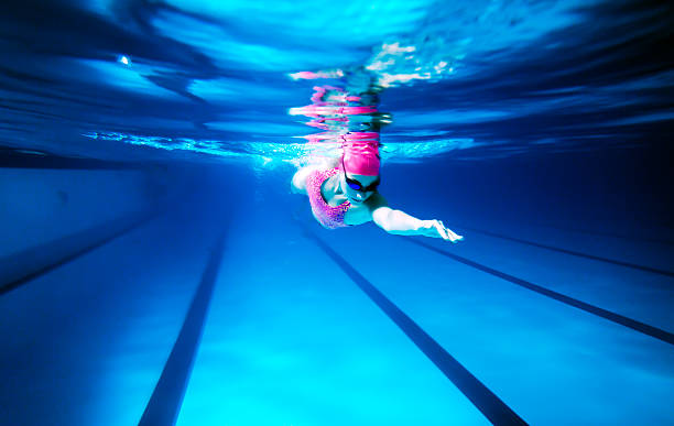 Woman Swimming Freestyle stock photo