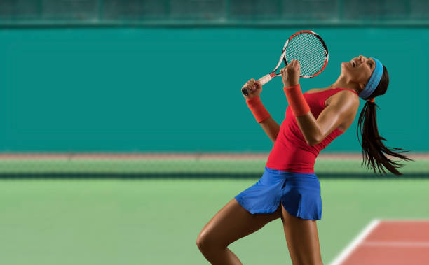 Woman tennis player celebrating winner stock photo