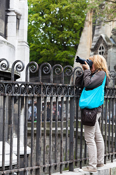 Woman Tourist with Camera in  Montmartre stock photo