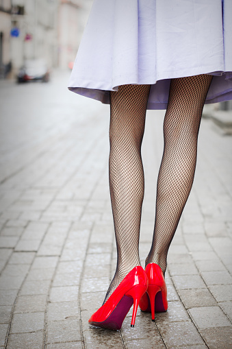 Woman Wearing Red High Heel Shoes In City Stock Photo - Download Image ...