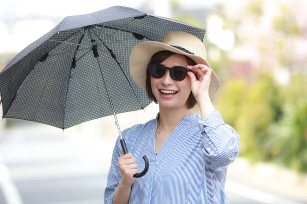 Woman with a parasol stock photo