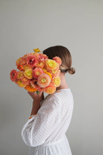 Woman with beautiful bouquet. stock photo