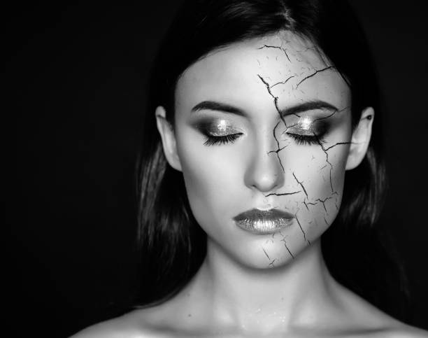 Woman with cracked face. stock photo