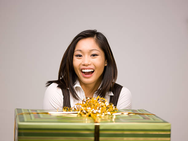 Woman with gift stock photo