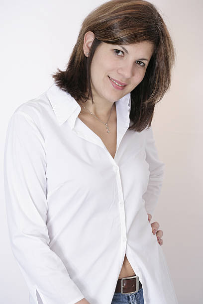 Woman with hand on her hip stock photo