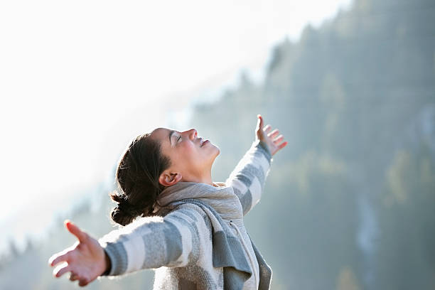 Woman with head back and arms outstretched  carefree stock pictures, royalty-free photos & images