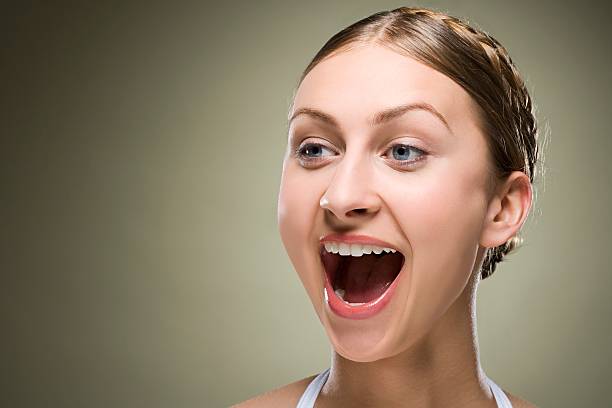 Woman with open mouth  mouth open stock pictures, royalty-free photos & images