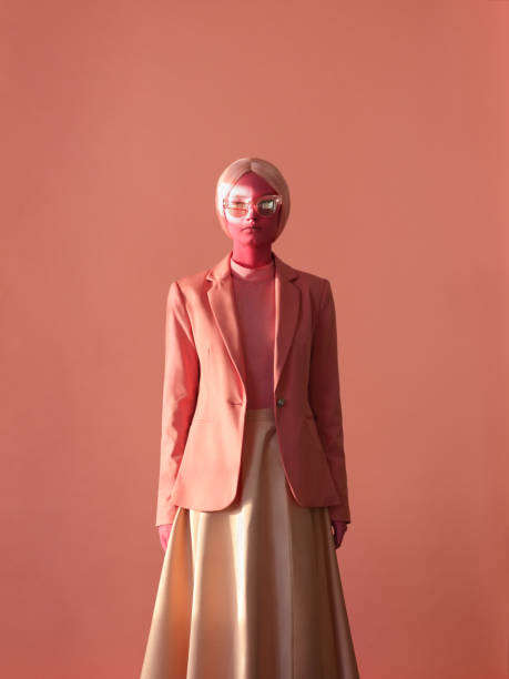 Woman with pink skin and pink eye glasses Woman with pink skin make-up, pink eyeglasses and pink blazer alien photos stock pictures, royalty-free photos & images
